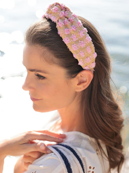 Add an elevated touch to your summer hairstyles with Shiraleah's Tufted Straw Knotted Headband. With its tufted fabric and top knot detail, this chic and trendy headband will be your new favorite summer accessory. Pair with other items from Shiraleah to complete your look!