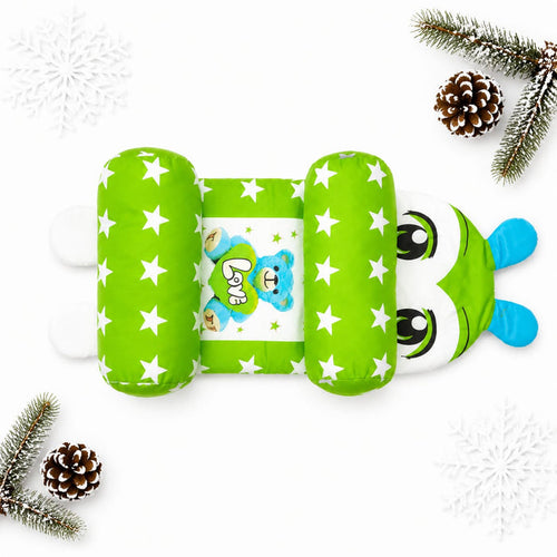 A green inflatable baby belly support cradle with white stars, featuring a cartoon bear design in the center and a frog face on the side, displayed on a white background with decorative pine branches and snowflakes.
