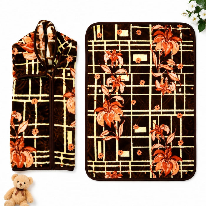 A two-piece fleece blanket set featuring a zippered hooded blanket and a matching flat throw blanket, both with a dark brown background, cream grid pattern, and orange floral motifs. Shown on a white background with a small teddy bear and white flowers as