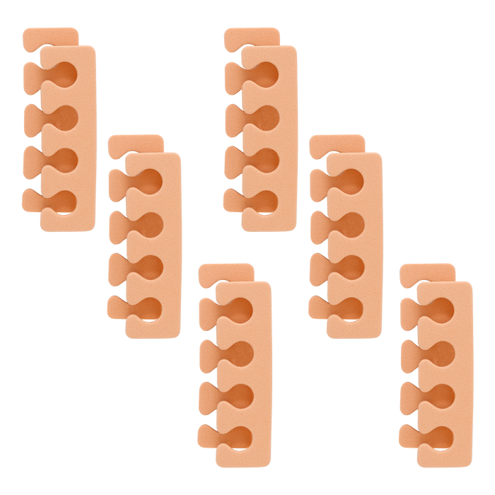 Six peach foam toe separators arranged on a white background