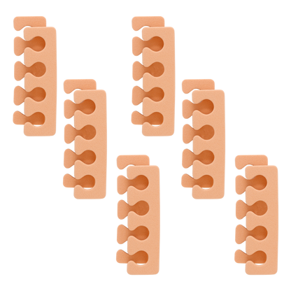 Six peach foam toe separators arranged on a white background
