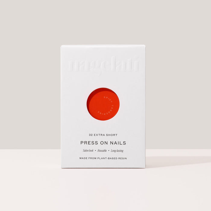 Press-on nails in plastic-free packaging made from FSC-certified paperboard.