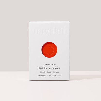 Press-on nails in plastic-free packaging made from FSC-certified paperboard.