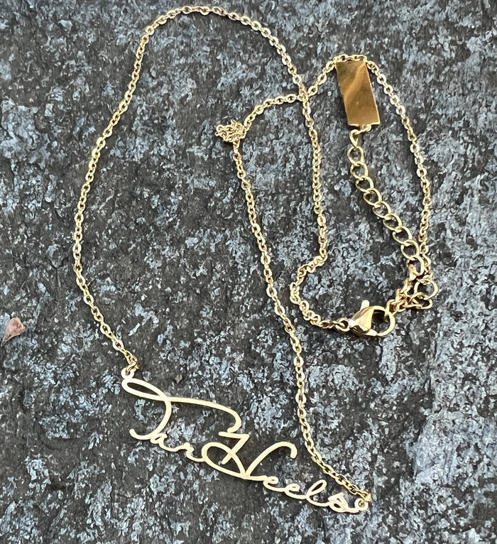 Tar Heels Gold Cursive Necklace by Steele Sloan Designs - Lifestyle View - Steele Sloan Designs