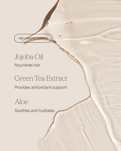 Product packaging with key ingredients listed on a beige background, designed to help color-treated hair with clean ingredients.