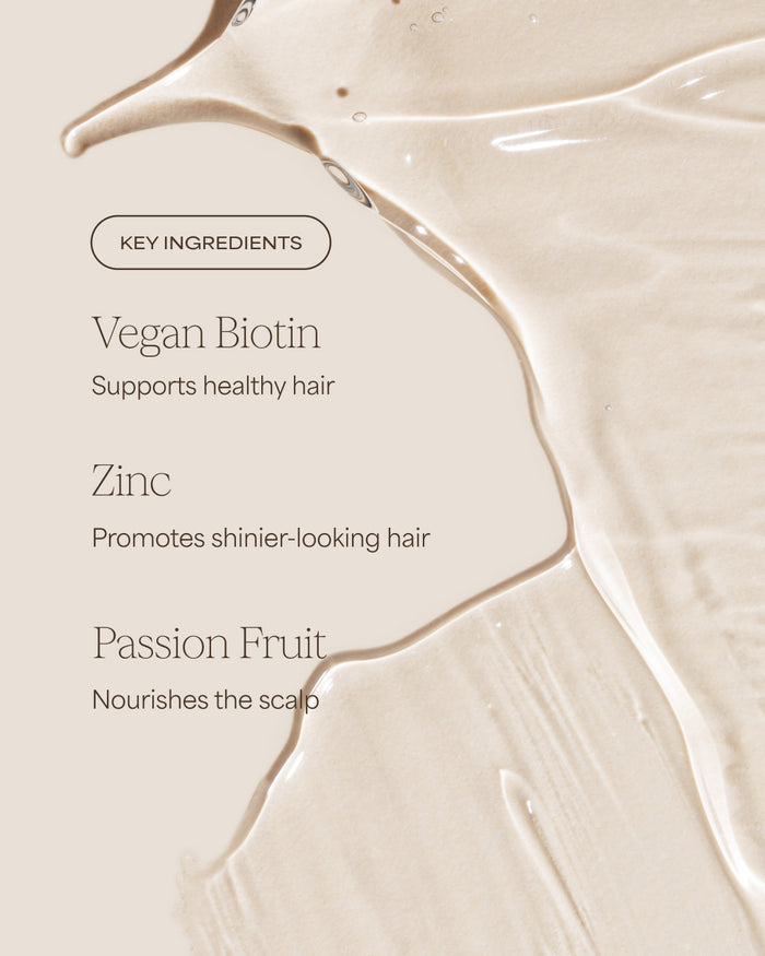 Product packaging with key ingredients for hair health on a beige background