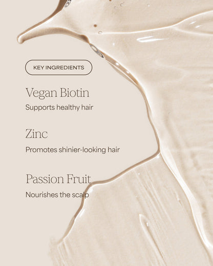 Product packaging with key ingredients for hair health on a beige background