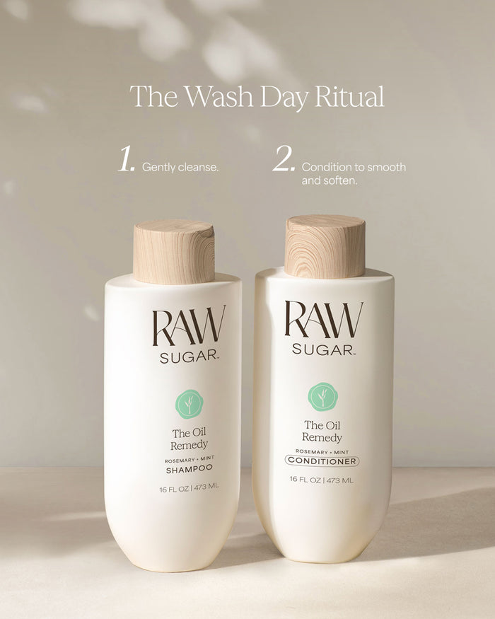 Two bottles of Raw Sugar shampoo and conditioner on a neutral background with text 'The Wash Day Ritual'.
