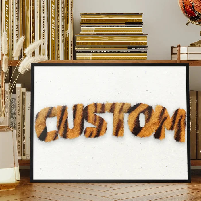 Personalized name print with realistic tiger stripe fur lettering in a black frame, on a white background.