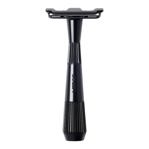 Black safety razor on a white background