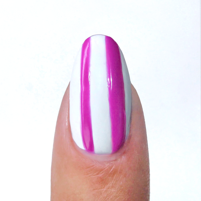 Ultra Violet liner used for neon purple vertical stripes on a sheer nude nail
