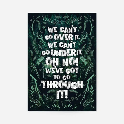 Green typography print with "We Can't Go Over It" quote, framed by dark green forest foliage.