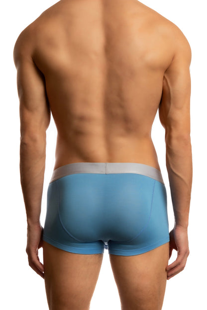 Man wearing pacific blue Jack Adams Zen Modal Trunks (back view) on a white background